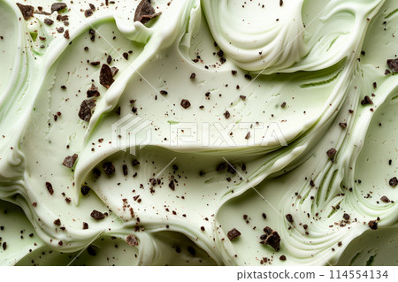 Macro photo of delicious Italian mint chips gelato as background, close up of ice cream scoop. Selective focus Macro photo of delicious Italian mint chips gelato as background, close up of ice cream scoop. Selective focus 114554134