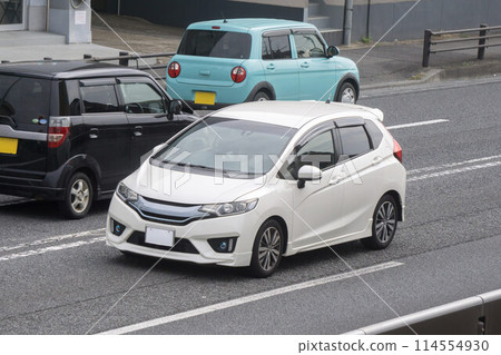 Compact car road driving 114554930