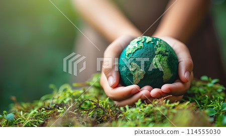 Hands Holding green Globe In Green Forest - Environment Concept 114555030