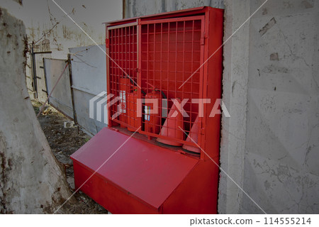 Red fire stand.Fire box with sand and fire extinguishing agents. Red fire stand.Fire box with sand and fire extinguishing agents. 114555214