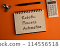 There is a notebook with the words Robotic Process Automation written on it. 114556518