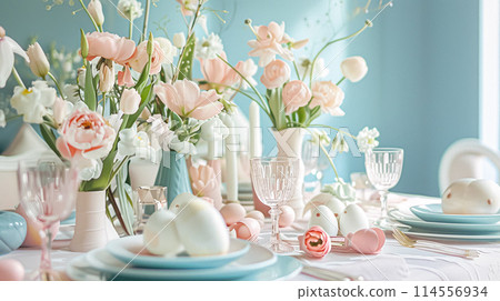 Easter table setting with painted eggs, spring flowers and crockery. Rustic style, selective focus 114556934