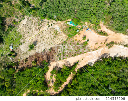 Mountain environmentally hazardous area,Top view tropical jungle natural landscape in Asia,Soil under condition of the erosion as the cliff by human Mountain environmentally hazardous area,Top view tropical jungle natural landscape in Asia,Soil under condition of the erosion as the cliff by human 114558206