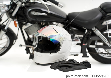 Motorcycle safety equipment: helmet and gloves 114559610
