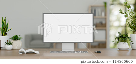 A desktop computer mockup and decor plants on a wooden desk in a minimal white office room. A desktop computer mockup and decor plants on a wooden desk in a minimal white office room. 114560660