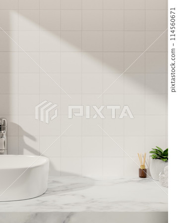 A luxurious white marble bathroom vanity countertop against the white tile wall with daylight shadow 114560671