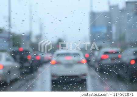 traffic on highway with cars on rainy day, blur background traffic on highway with cars on rainy day, blur background 114561071
