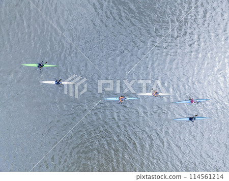 Kayaking top view. Group of kayaks rowing. Aerial view from drone. 114561214