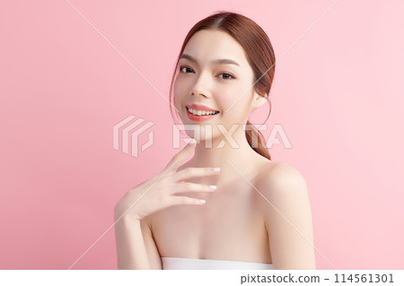 Beautiful young asian woman with clean fresh skin on pink background, Face care, Facial treatment, Cosmetology, beauty and spa, Asian women portrait. Beautiful young asian woman with clean fresh skin on pink background, Face care, Facial treatment, Cosmetology, beauty and spa, Asian women portrait. 114561301