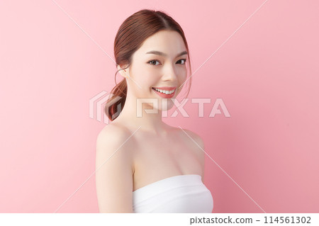 Beautiful young asian woman with clean fresh skin on pink background, Face care, Facial treatment, Cosmetology, beauty and spa, Asian women portrait. 114561302