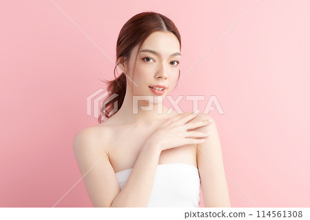 Beautiful young asian woman with clean fresh skin on pink background, Face care, Facial treatment, Cosmetology, beauty and spa, Asian women portrait. 114561308