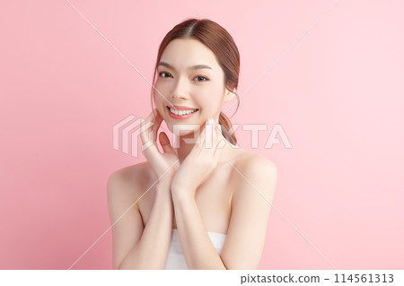 Beautiful young asian woman with clean fresh skin on pink background, Face care, Facial treatment, Cosmetology, beauty and spa, Asian women portrait. 114561313