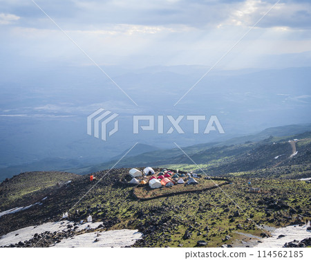 Closer view on a mountain tent camp set in the middle of highlands landscape, Mount Ararat in Turkey 114562185