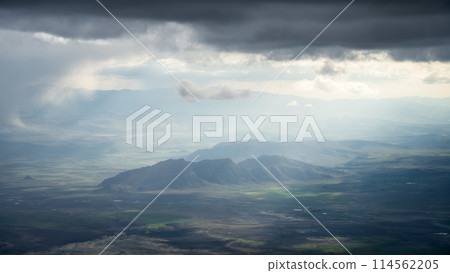 Armenian highlands landscape with mountains, green fields and thick clouds, Mount Ararat in Turkey 114562205