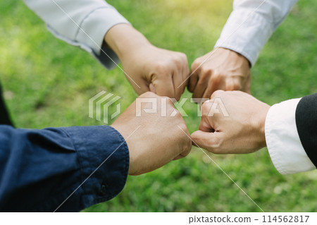Group of volunteer people joining for cooperation about global community teamwork with join hand together, World environment day, sustainable development goal. 114562817
