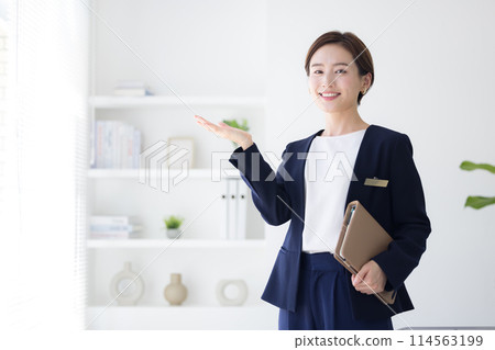 Portrait of a woman in a business suit Portrait of a woman in a business suit 114563199