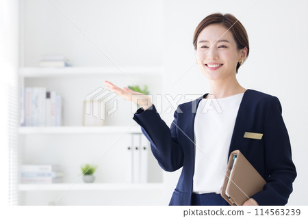 Portrait of a woman in a business suit 114563239