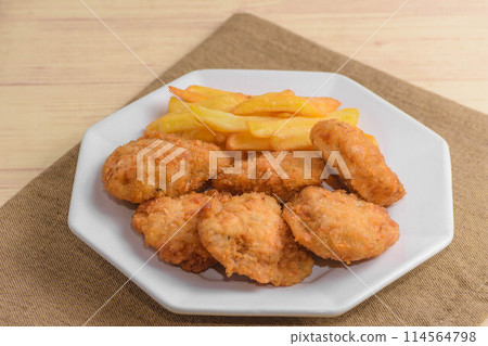 Bite-sized cutlet and French fries Bite-sized cutlet and French fries 114564798