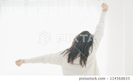 A woman waking up and growing A woman waking up and growing 114568633
