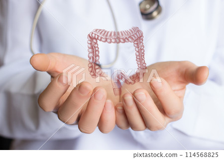 Doctor supporting colon . Doctor supporting colon . 114568825