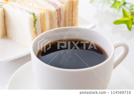 hot coffee and sandwiches 114569718