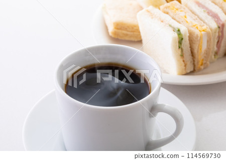 hot coffee and sandwiches 114569730