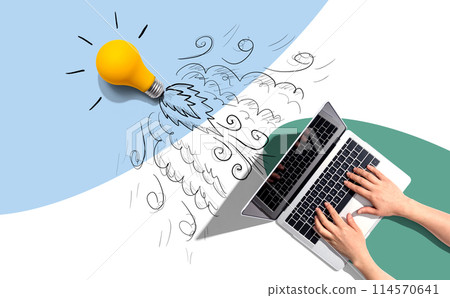 Idea light bulb flying to the sky like a rocket from a laptop computer 114570641