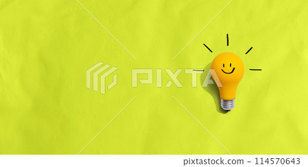 Yellow light bulb with happy face Yellow light bulb with happy face 114570643