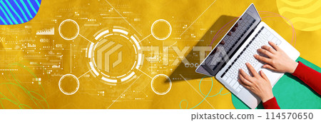 Tech circle with person using a laptop Tech circle with person using a laptop 114570650