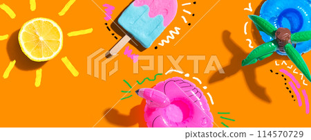 Summer concept with a flamingo float, lemon sunlight and a popsicle Summer concept with a flamingo float, lemon sunlight and a popsicle 114570729