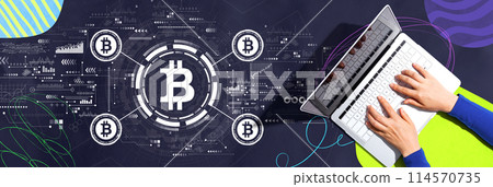 Bitcoin theme with person using a laptop 114570735