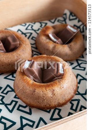 Round almond hazelnut and chocolate financiers Round almond hazelnut and chocolate financiers 114573513
