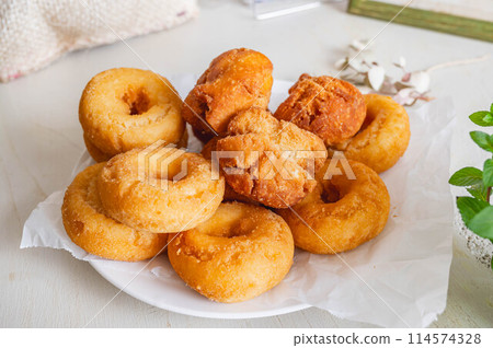 Fried confectionery donuts 114574328