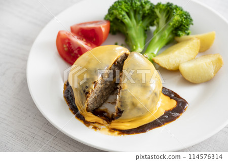 Hamburg steak topped with cheese 114576314