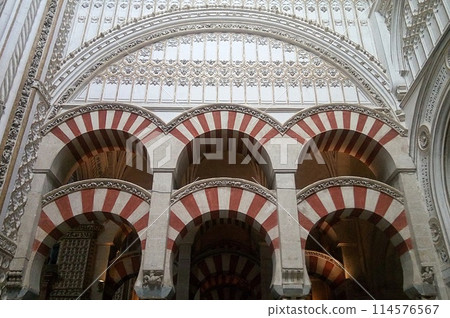 Interior with column of Mezquita mosque cathedral of Cordoba. Cordoba, Spain - June 14, 2016 114576567
