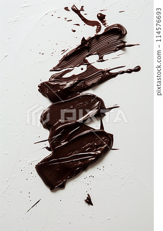 Tempting chocolate paste smear on white surface, top view, delicious sweet treat concept 114576693