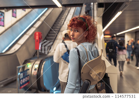portrait attractive young woman in subway 114577531