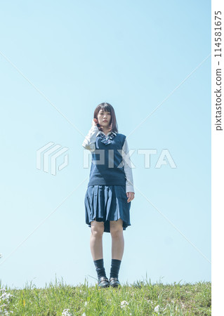 Refreshing blue sky and high school girls 114581675