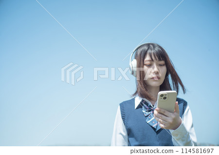 Headphones, smartphone and high school girl 114581697