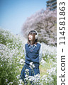 Headphones, cherry blossoms and high school girl 114581863