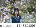 Headphones, cherry blossoms and high school girl 114581866