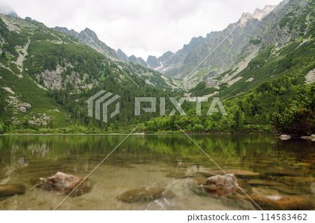 Breathtaking view of the mountains on a hiking trail. Location of the High Tatras Mountains, Europe. 114583462