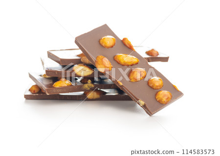 Broken chocolate bar with almonds isolated on white background. Broken chocolate bar with almonds isolated on white background. 114583573