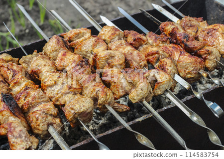 Kebabs on the grill 114583754