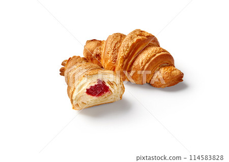 Whole and sliced croissants with berry jam filling on white Whole and sliced croissants with berry jam filling on white 114583828
