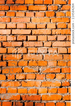 texture of a wall of red brick. dirty masonry pattern. reconstruction process 114584264