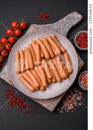 Delicious vegetarian or vegan sausages with salt, spices and herbs Delicious vegetarian or vegan sausages with salt, spices and herbs 114584619