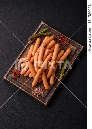 Delicious vegetarian or vegan sausages with salt, spices and herbs Delicious vegetarian or vegan sausages with salt, spices and herbs 114584628