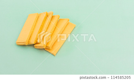 Bio Pop Up Kitchen Dish Sponge, Cellulose Compressed Sponge on Green Background, Eco Natural Product for Cleaning, Sanitation. Mockup, Copy Space for Text. Horizontal Plane, Design Bio Pop Up Kitchen Dish Sponge, Cellulose Compressed Sponge on Green Background, Eco Natural Product for Cleaning, Sanitation. Mockup, Copy Space for Text. Horizontal Plane, Design 114585205