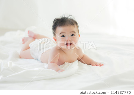 Baby wrapped in white cloth Baby wrapped in white cloth 114587770